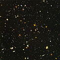 Campo Ultraprofundo del Hubble

El Telescopio Espacial Hubble muestra el retrato más profundo del universo visible jamás obtenido por la Humanidad. Este ha recibido el nombre de Campo Ultraprofundo del Hubble y para su realización se ha empleado una exposición de más de un millón de segundos, lo cual ha constituido 400 órbitas del telescopio espacial en torno a la Tierra. La imagen revela las primeras galaxias que emergieron de las llamadas "edades oscuras", los cuerpos que comenzaron a calentar